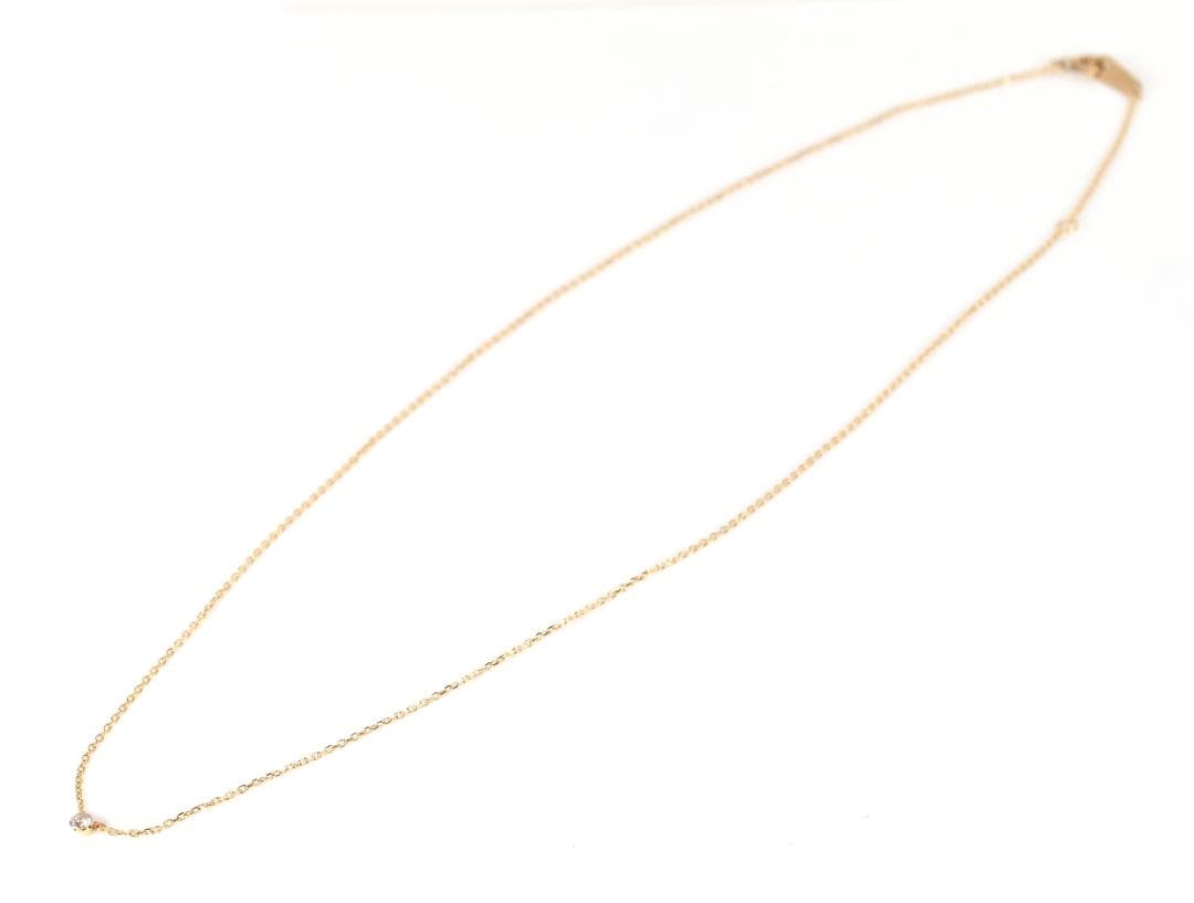agete Law yellow gold necklace featuring one pearl and a small diamond, 40 cm length with 3 cm adjuster
