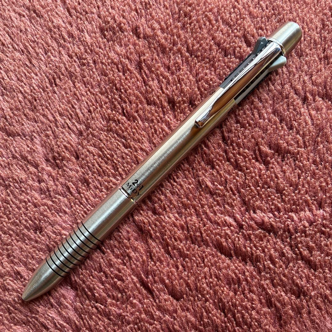 Pilot 2+1 Midy multi-function pen with stainless steel body showing rotating mechanism