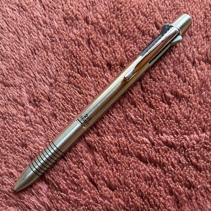 Pilot 2+1 Midy multi-function pen with stainless steel body showing rotating mechanism