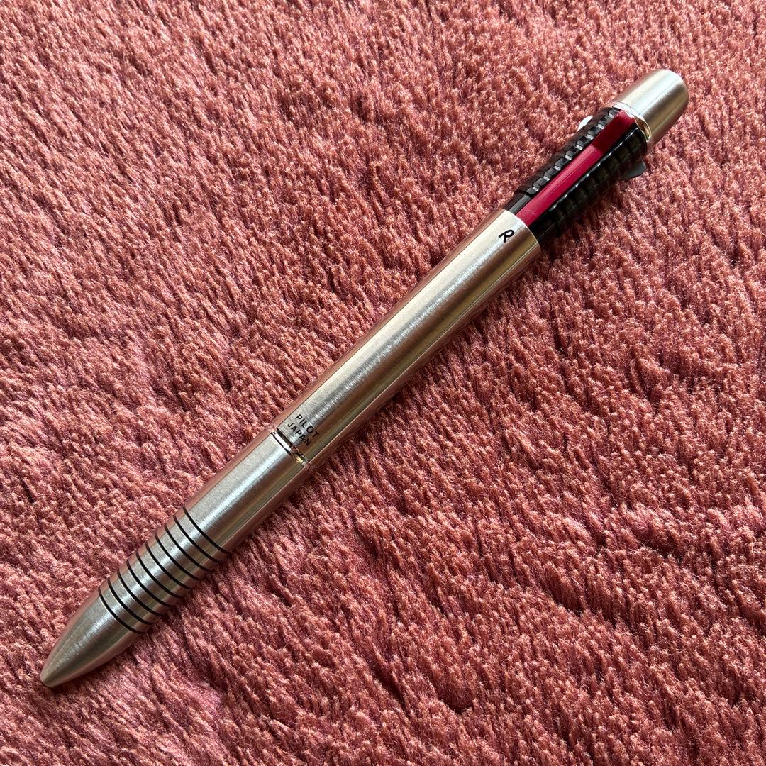Pilot 2+1 Midy multi-function pen with stainless steel body showing rotating mechanism
