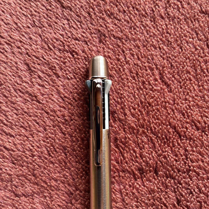 Pilot 2+1 Midy multi-function pen with stainless steel body showing rotating mechanism