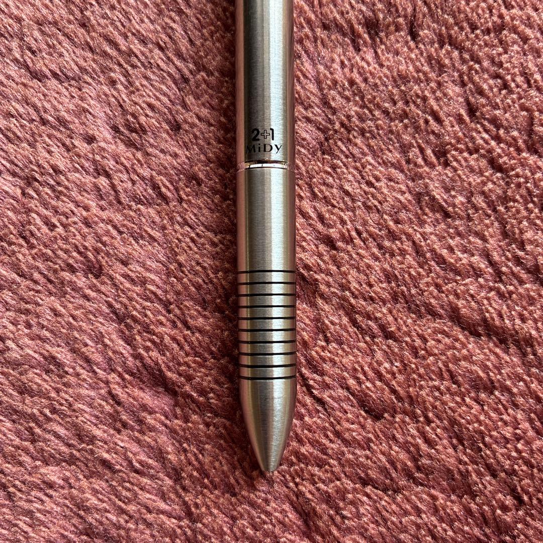 Pilot 2+1 Midy multi-function pen with stainless steel body showing rotating mechanism