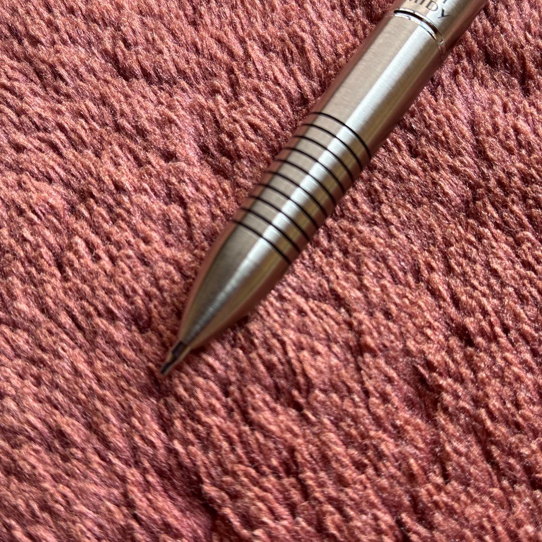 Pilot 2+1 Midy multi-function pen with stainless steel body showing rotating mechanism