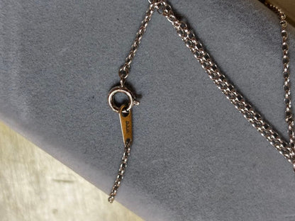 MIKIMOTO Moon Dew pearl necklace showing main body and ribbon with visible scratches