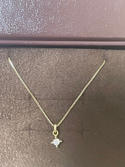 Agato K18 single diamond necklace weighing approximately 1.7 to 1.8 grams displayed on a white background