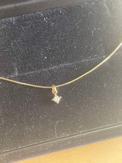 Agato K18 single diamond necklace weighing approximately 1.7 to 1.8 grams displayed on a white background