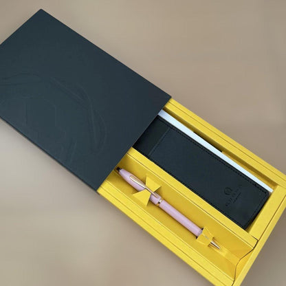 Law Kuro ballpoint pen gift set with smoky pink finish and rose gold plating, showing black ink pen