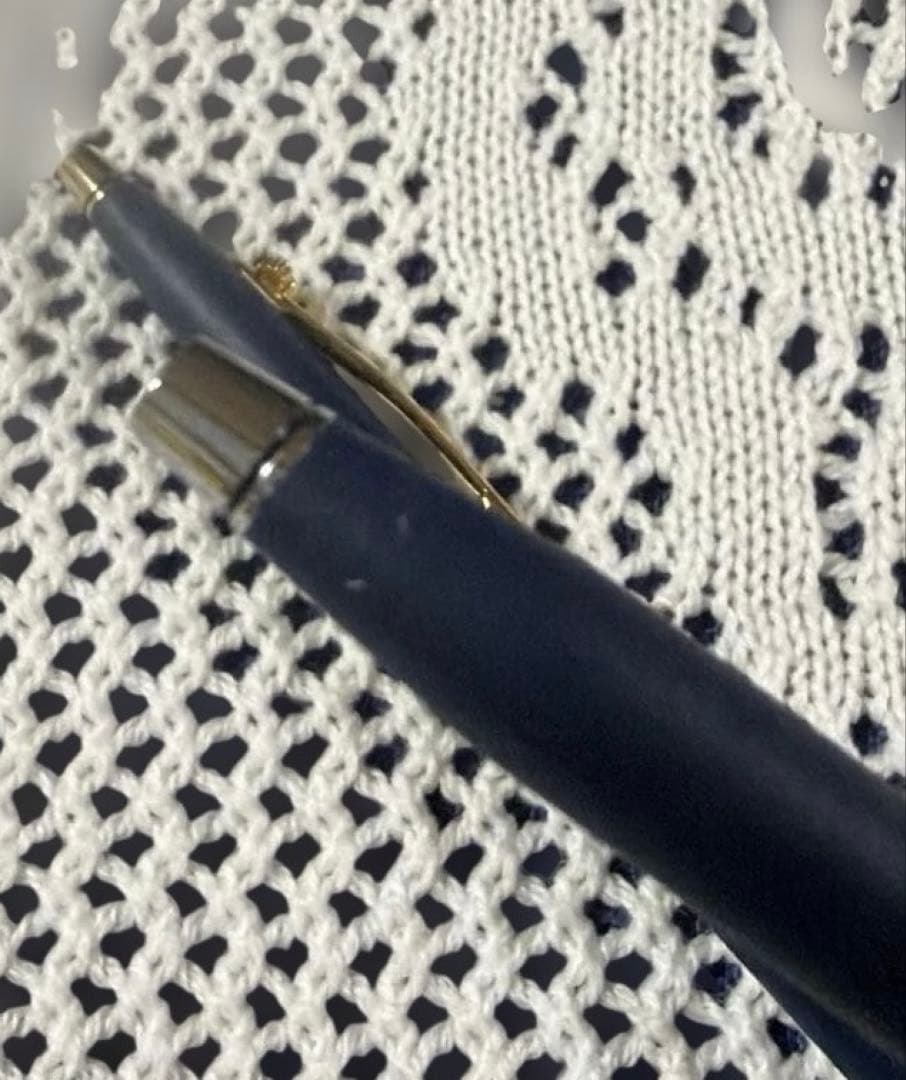 Cross 2-piece ballpoint pen set in gold and silver with navy accents, displayed with gift box and manual