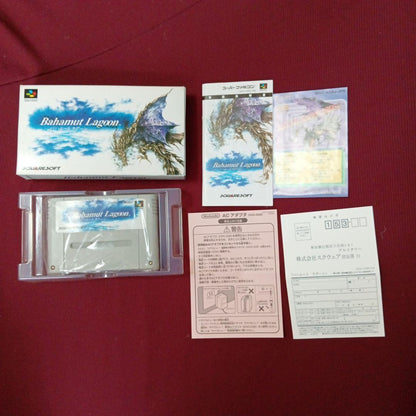 Super Famicom Bahamut Lagoon game with box, manual, advertisement, and dedicated postcard