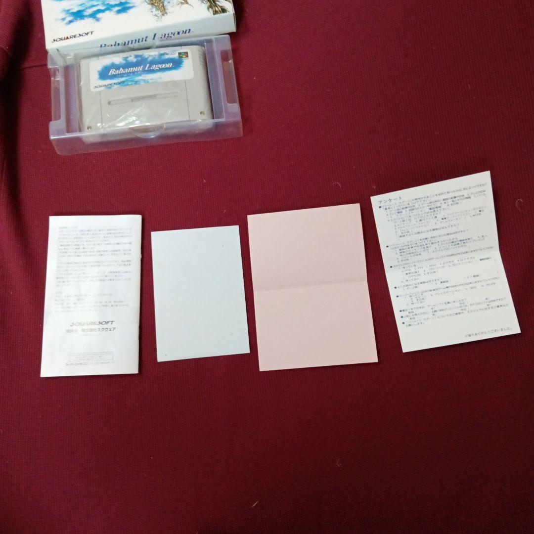 Super Famicom Bahamut Lagoon game with box, manual, advertisement, and dedicated postcard