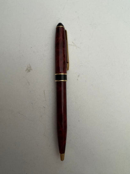 Waterman Marble Pattern ballpoint pen in red marble with gold trim and twist mechanism