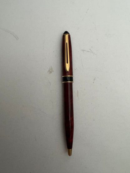 Waterman Marble Pattern ballpoint pen in red marble with gold trim and twist mechanism