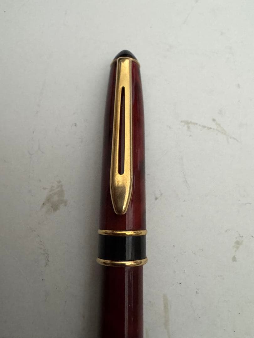Waterman Marble Pattern ballpoint pen in red marble with gold trim and twist mechanism
