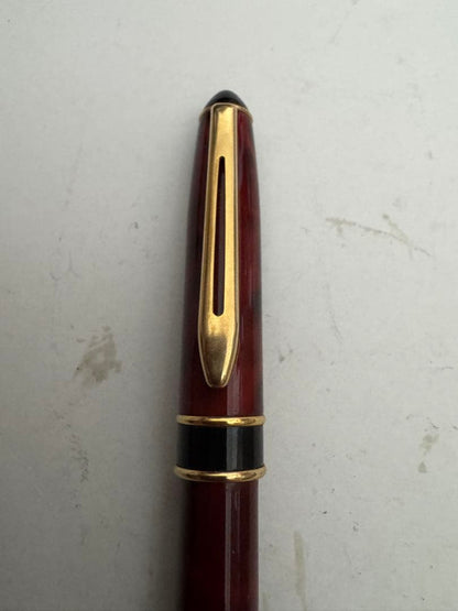 Waterman Marble Pattern ballpoint pen in red marble with gold trim and twist mechanism