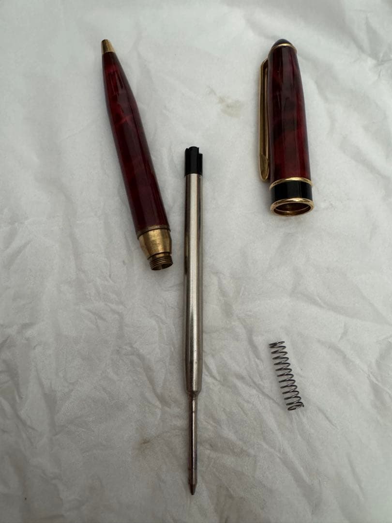 Waterman Marble Pattern ballpoint pen in red marble with gold trim and twist mechanism