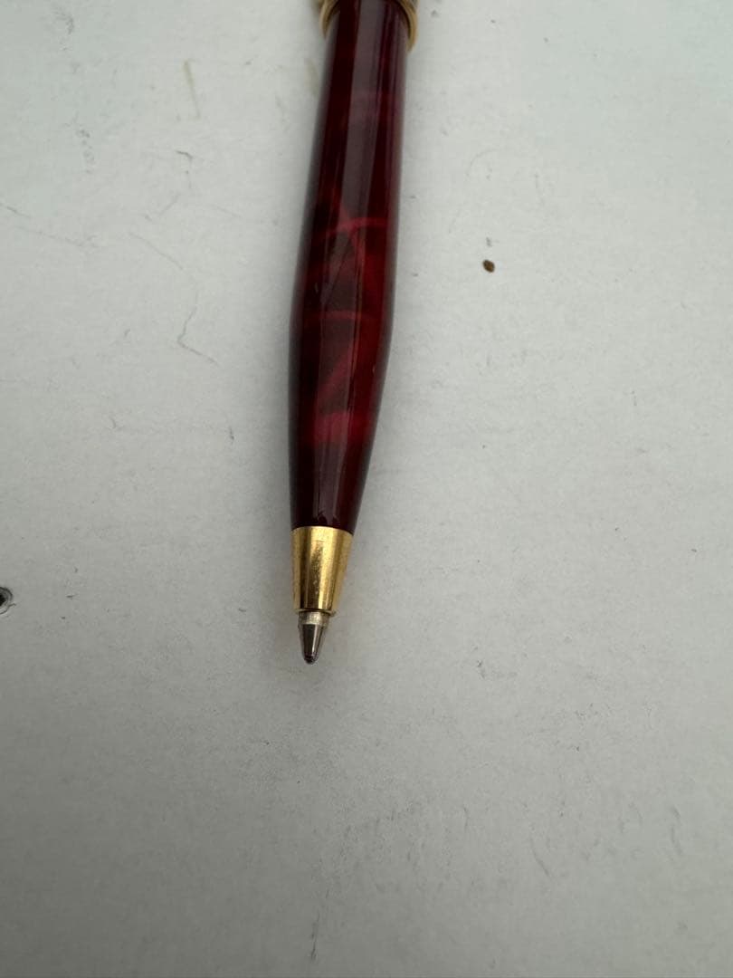 Waterman Marble Pattern ballpoint pen in red marble with gold trim and twist mechanism