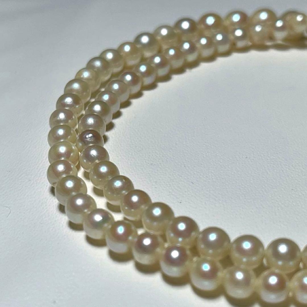 Akoya pearl necklace with round white pearls 3.3-7.4mm and silver stamp on a 45cm chain