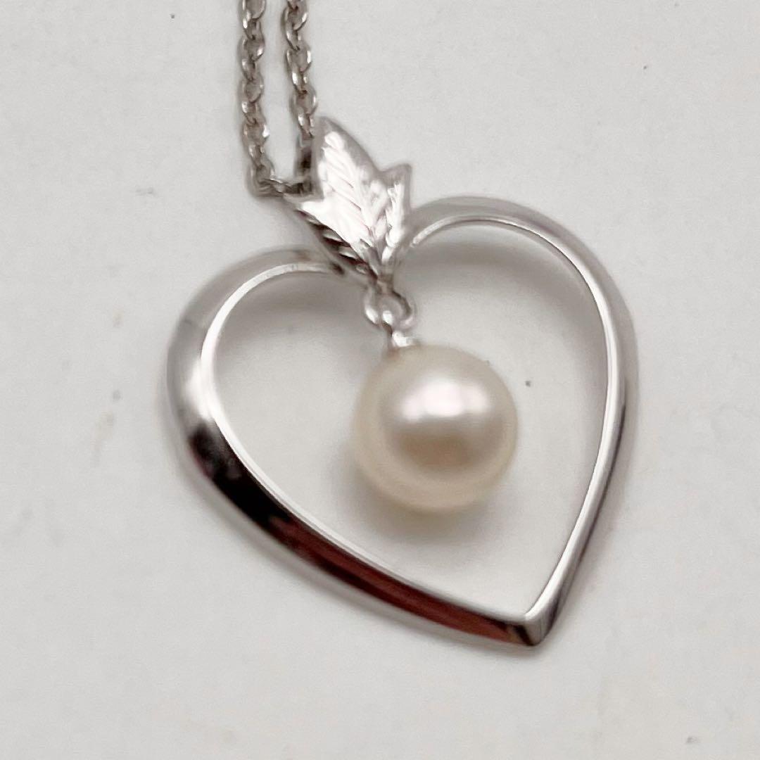 Mikimoto necklace with one genuine white pearl on a silver chain with engraved silver clasp