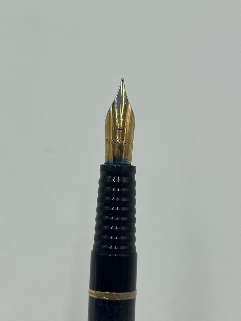 Waterman Fountain Pen Black with fine nib shown from side angle on white background