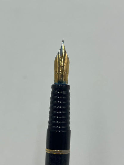 Waterman Fountain Pen Black with fine nib shown from side angle on white background