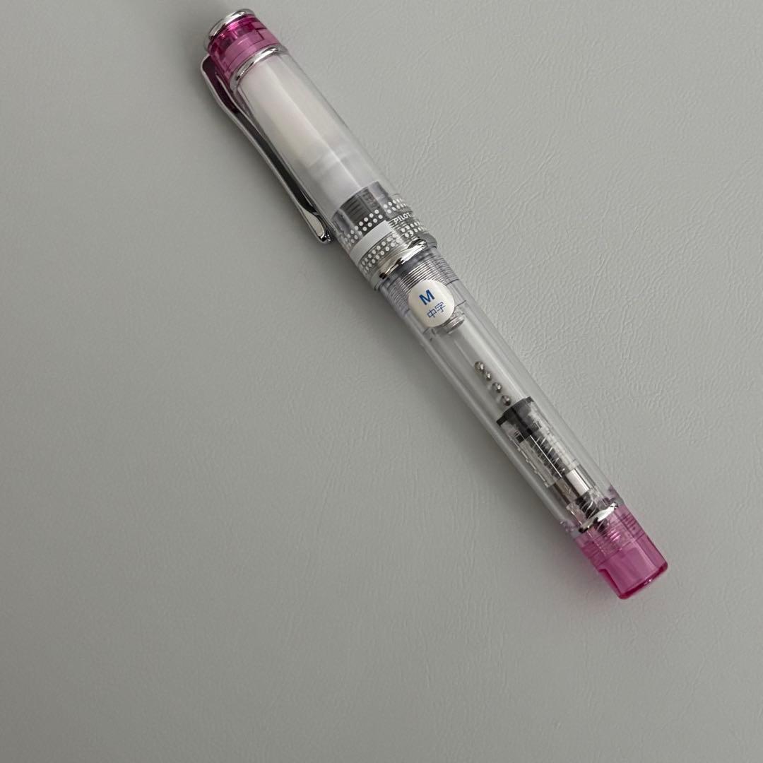 PILOT PRERA fountain pen clear pink body with medium nib tip shown uncapped