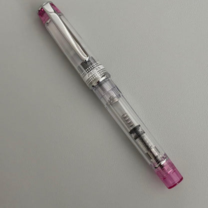 PILOT PRERA fountain pen clear pink body with medium nib tip shown uncapped
