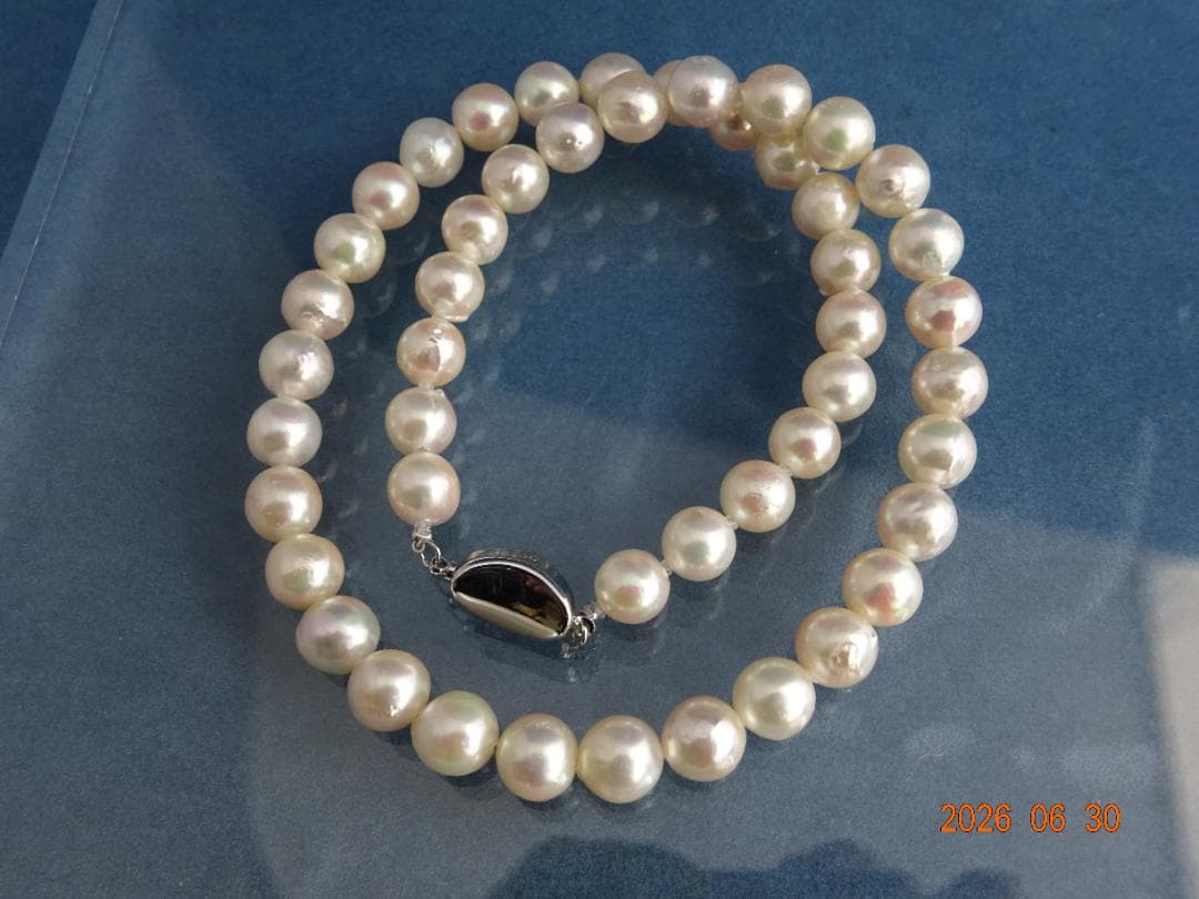 Akoya pearl necklace featuring 8-8.5mm almost round and semi-round pearls with a 43cm one-touch silver clasp