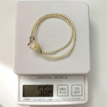 K18 gold necklace with natural white Akoya baby pearls sized 2.5-3mm on a 39cm chain