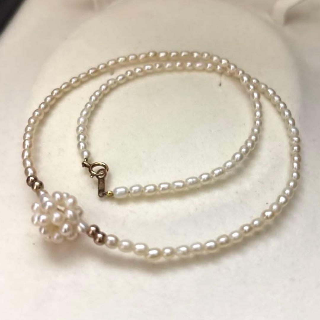 K18 gold necklace with natural white Akoya baby pearls sized 2.5-3mm on a 39cm chain