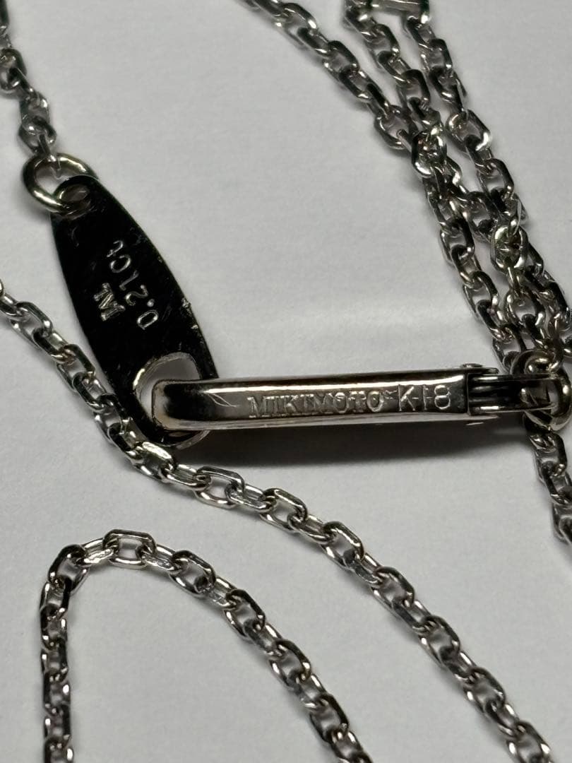 Mikimoto K18 gold necklace featuring a 0.21 carat diamond pendant weighing approximately 2.8 grams