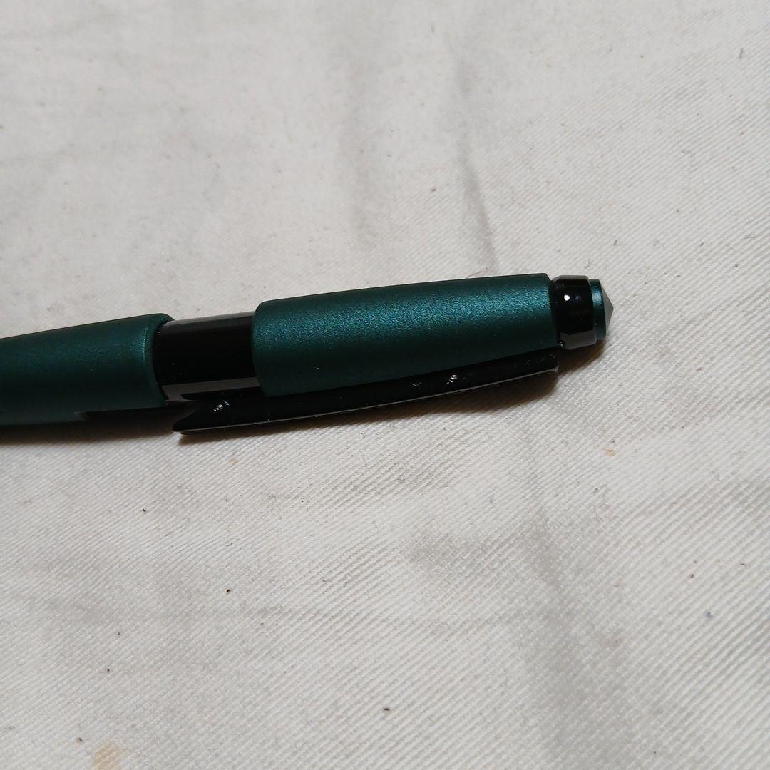 CROSS Edge ballpoint pen with matte green and black body shown from side angle