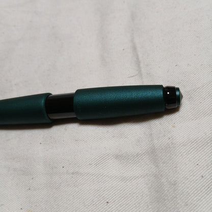 CROSS Edge ballpoint pen with matte green and black body shown from side angle