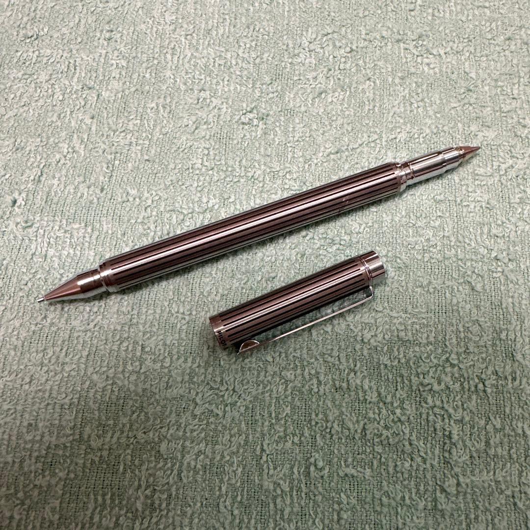 Silver Pilot Switch key-engraved pen with fine tip and stripe design beside its case
