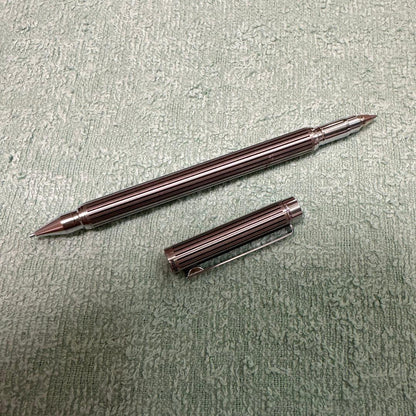 Silver Pilot Switch key-engraved pen with fine tip and stripe design beside its case