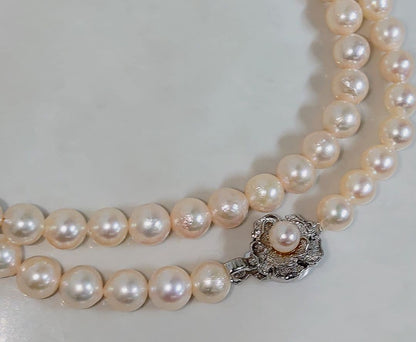 Akoya pearl long necklace with 7-8 mm pinkish white pearls on silver chain, length 81 cm