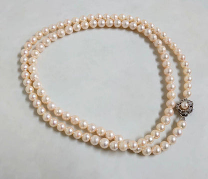 Akoya pearl long necklace with 7-8 mm pinkish white pearls on silver chain, length 81 cm