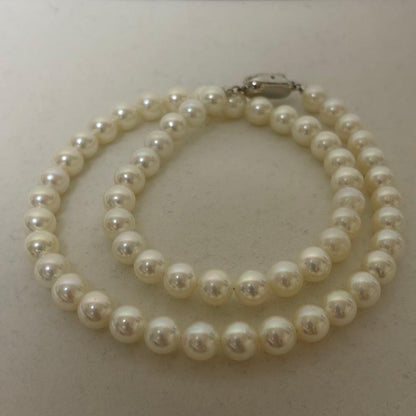 Tenyo Class Akoya pearl necklace and matching earrings with 7.5mm pearls and silver and K18 settings