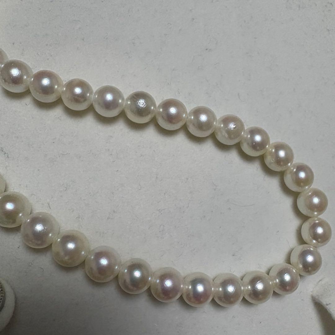 Tenyo Class Akoya pearl necklace and matching earrings with 7.5mm pearls and silver and K18 settings