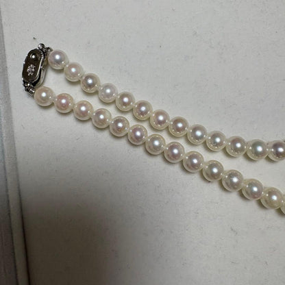 Tenyo Class Akoya pearl necklace and matching earrings with 7.5mm pearls and silver and K18 settings