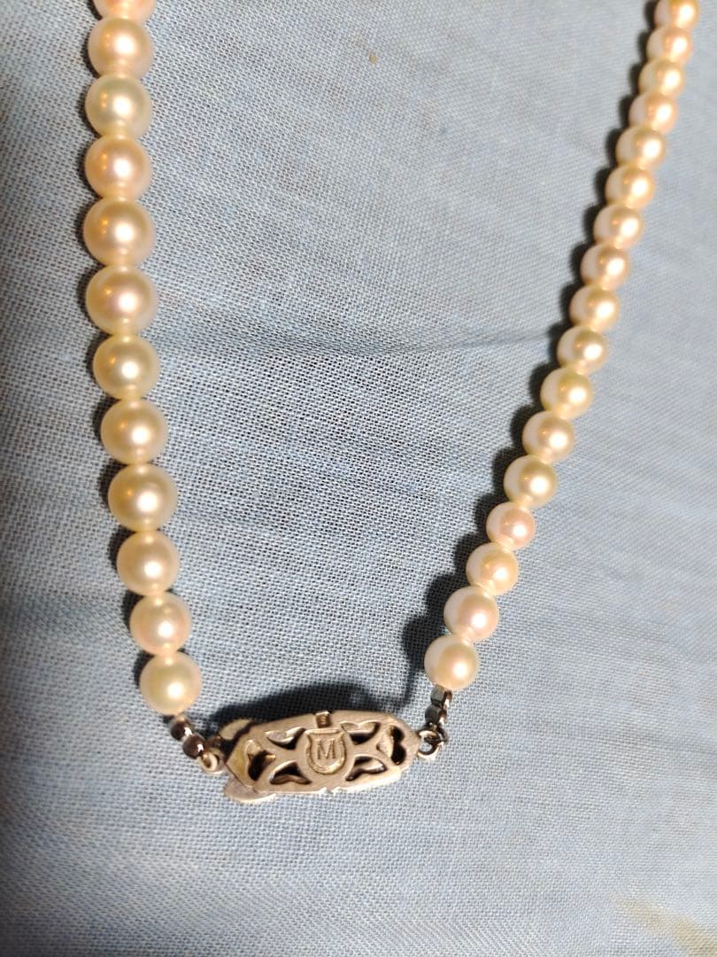 Mikimoto silver necklace with a single 5.8mm genuine pearl pendant weighing 20 grams