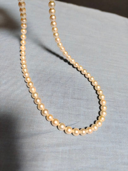 Mikimoto silver necklace with a single 5.8mm genuine pearl pendant weighing 20 grams