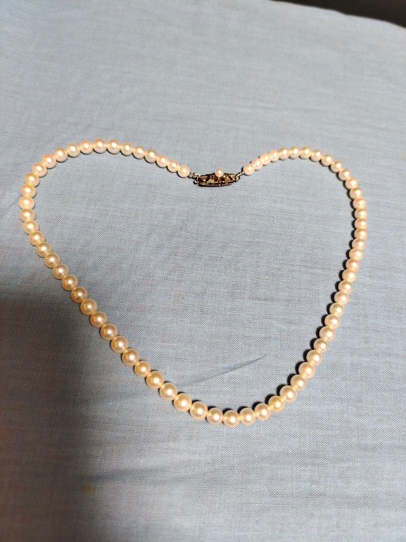 Mikimoto silver necklace with a single 5.8mm genuine pearl pendant weighing 20 grams