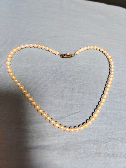 Mikimoto silver necklace with a single 5.8mm genuine pearl pendant weighing 20 grams