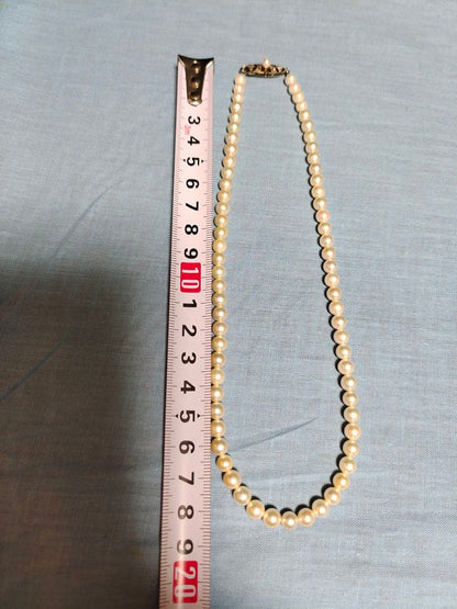 Mikimoto silver necklace with a single 5.8mm genuine pearl pendant weighing 20 grams