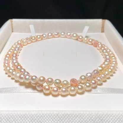 Shell Rose and Akoya Pearl long necklace with 6.5-9.5mm pearls measuring approximately 80.1 cm