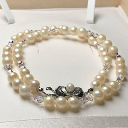 Akoya pearl and crystal necklace measuring 46.5cm with 6.6-6.9mm pearls, styled for dining events
