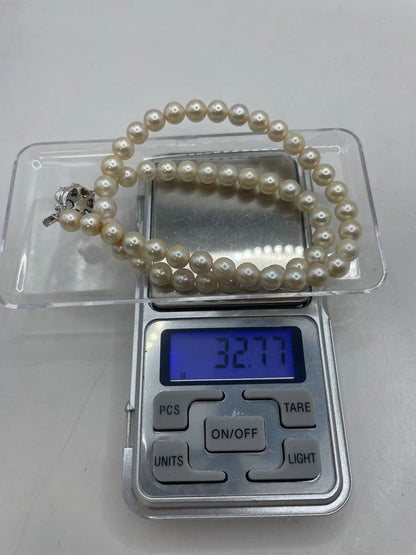 Akoya pearl silver necklace featuring 7mm genuine pearls on a 40cm silver chain