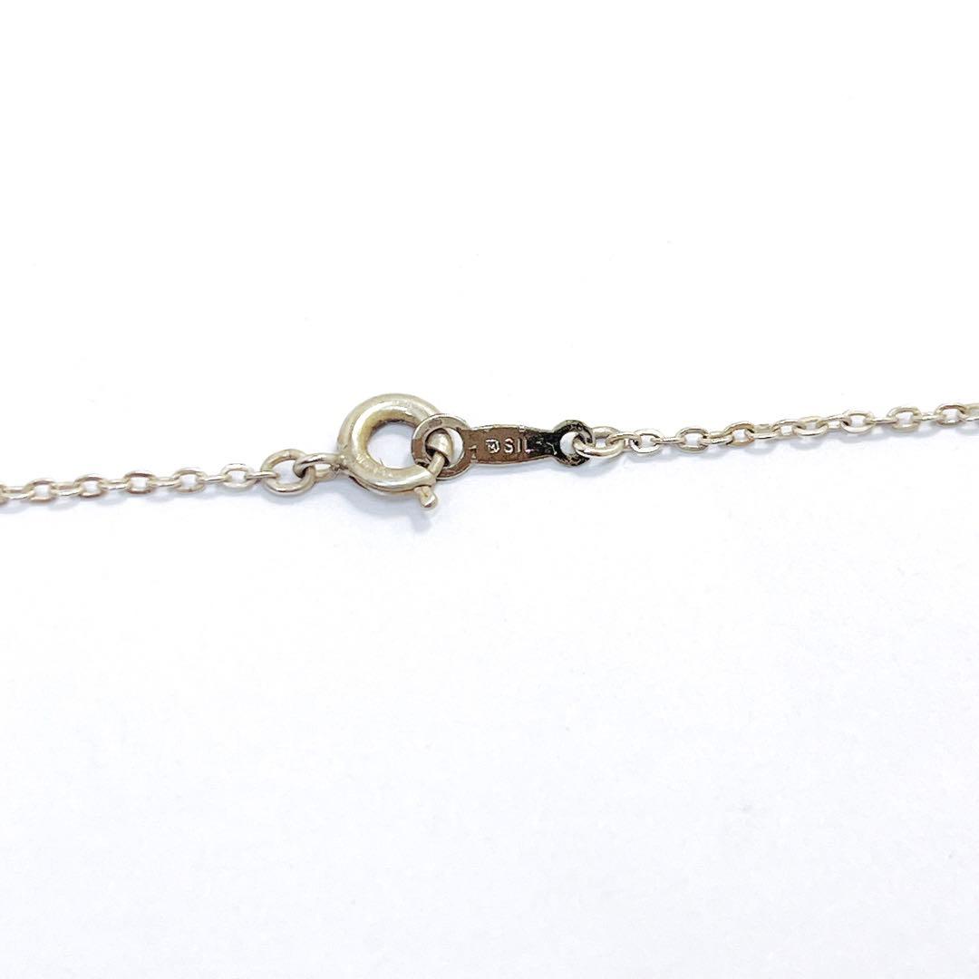 Mikimoto pearl necklace with 5.3mm pearls and silver leaf pendant on 40cm chain