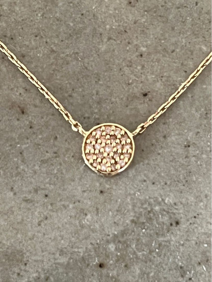 Kuro Diamond Necklace made of 18K gold featuring multiple small micro-set diamonds on a delicate chain