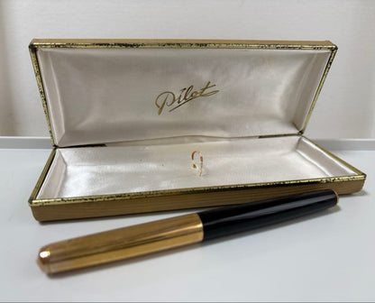 Vintage Pilot Super 300 fountain pen with 14K nib and accompanying case shown on white background